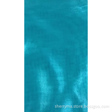 The best-seller 100% polyester organza with flocking plain dyed for garment